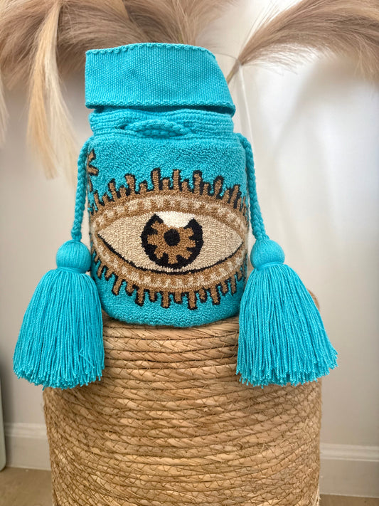 Upholstered mini evil eye bucket Bag